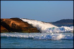 Wave against rock